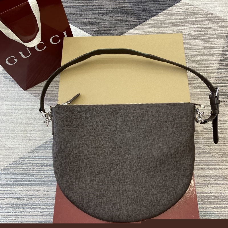 G*u*i top handle bags
